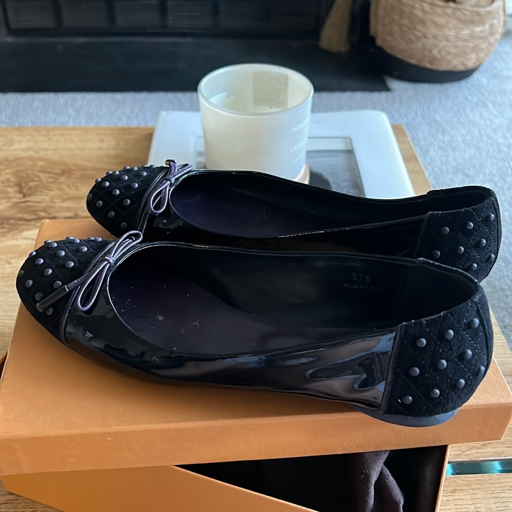 Tod’s black ballerinas